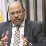 Egypt’s Finance Minister Hany Kadry Dimian talks during an interview with Reuters at his office in Cairo